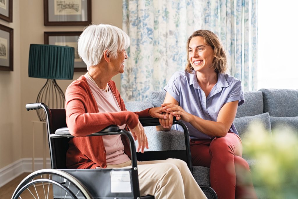 Blog 4 GettyImages 1316202210 WHEELCHAIR CARER COUCH